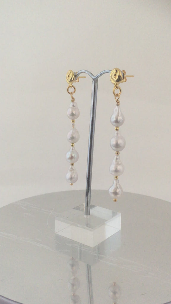 Long Teardrp pearl earrings with four teardrop pearls on each earring
