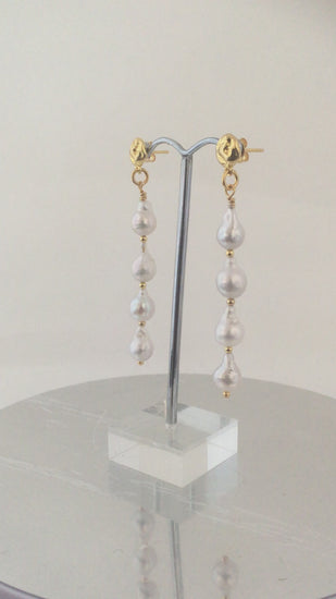Long Teardrp pearl earrings with four teardrop pearls on each earring